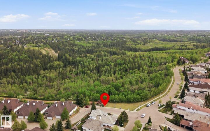 Property Photo: 777 Butterworth Drive NW AB T6R 2P6