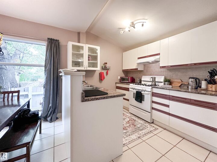 Property Photo: 11825 80 Street NW AB T5B 2N6