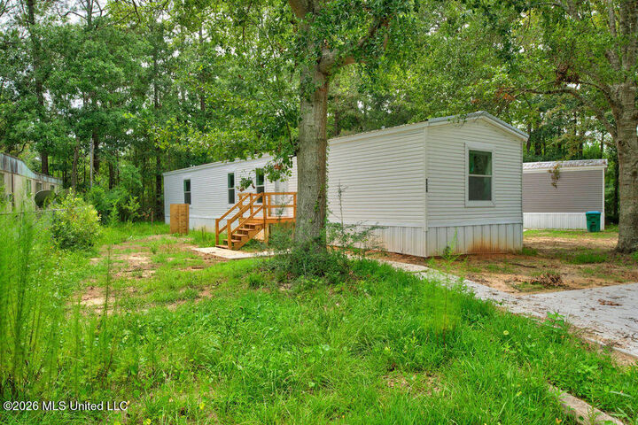 Property Photo: 7729 Narcissus Drive MS 39553