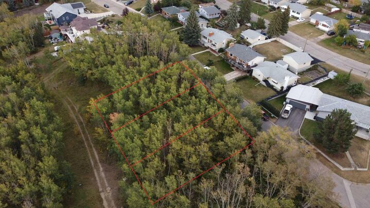 Property Photo: 5007, 5009, 5011 42B Street AB T4J 1C4