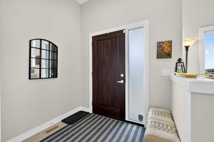 Property Photo: 1066 Creekside Boulevard SW AB T2X 5K6