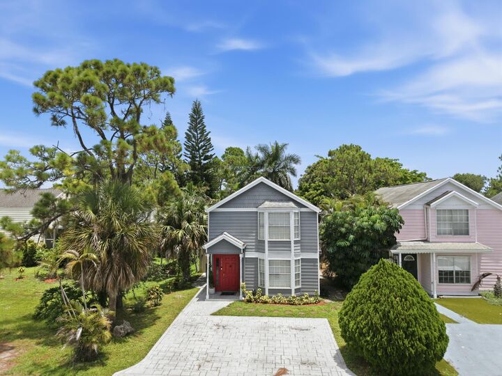 Property Photo: 5825 Dewberry Way FL 33415