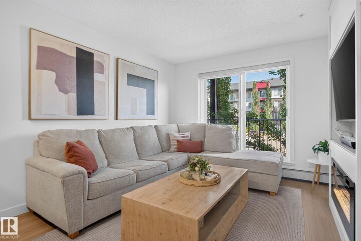 Property Photo: 5521 7 Avenue SW 203 AB T6X 2A8