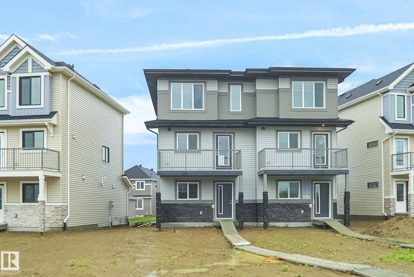 Property Photo: 625 176 Avenue NE AB T5Y 4K3