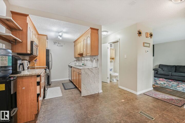 Property Photo:  203B Homestead Crescent NW  AB T5A 2Y2 