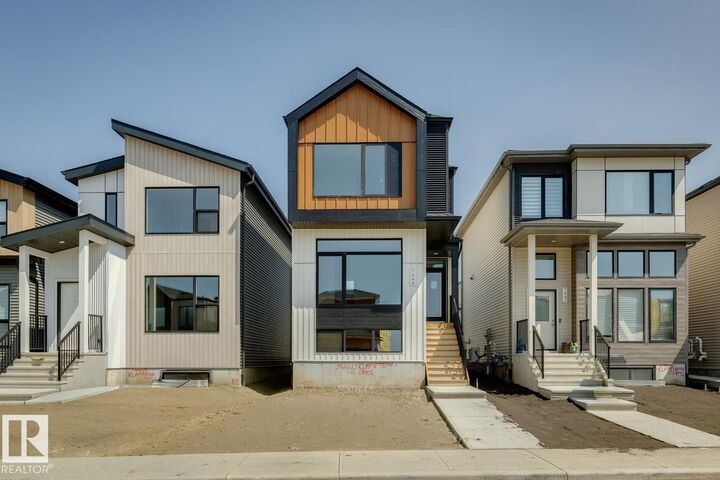 Property Photo:  7444 Klapstein Crescent SW  AB T6W 5N7 