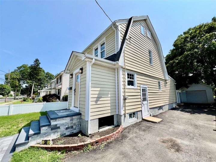 Property Photo: 50 E Saint Marks Place NY 11580