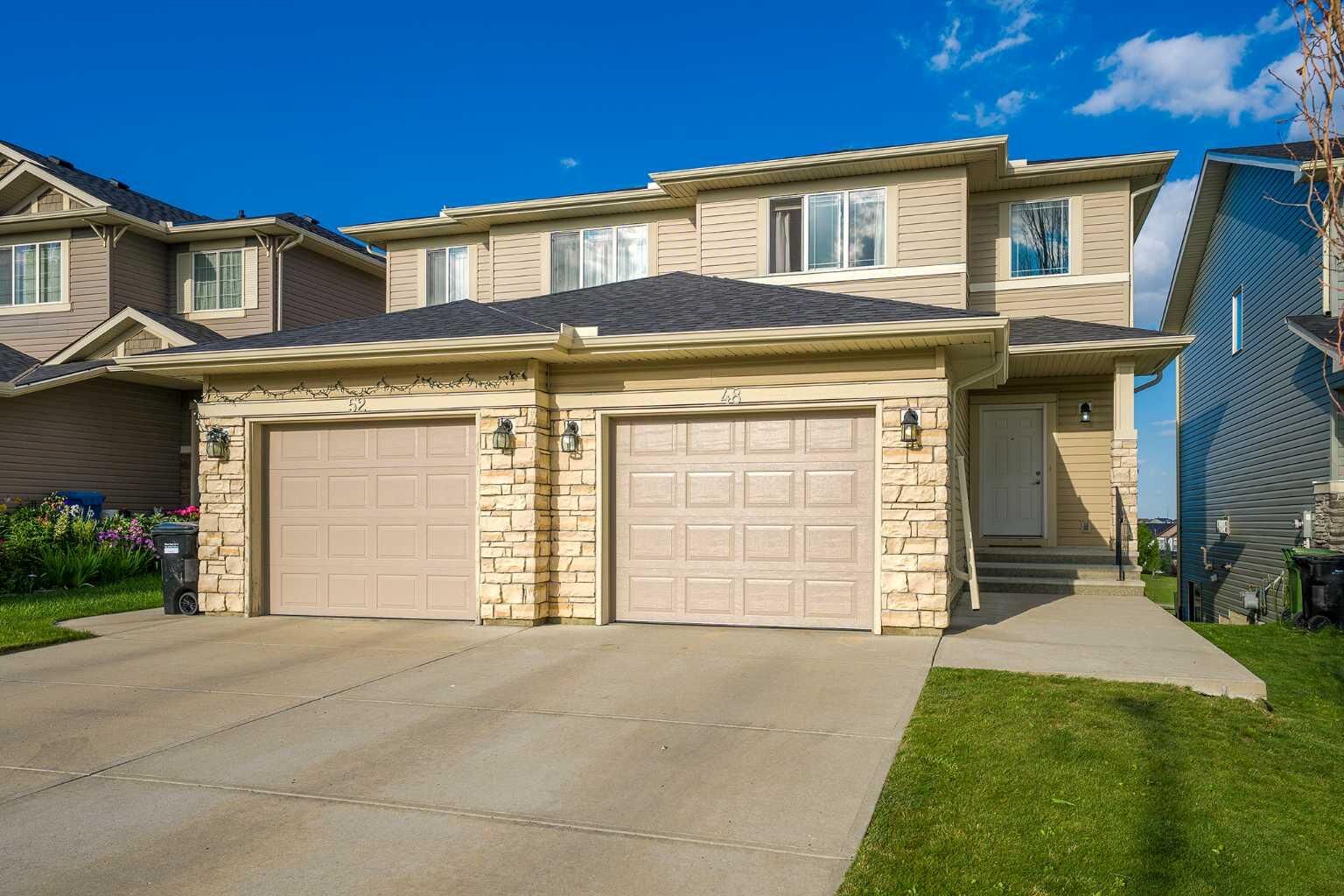 Property Photo: 48 Panatella Common NW AB T3K 0T5