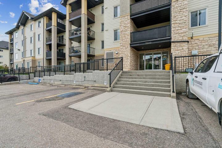 Property Photo: 304 Mackenzie Way SW 7207 AB T4B 3H7