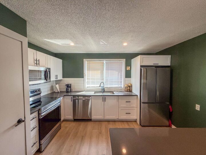 Property Photo: 119 Fallswater Crescent NE AB T3J 1B5