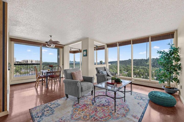 Property Photo: 145 Point Drive NW 1607 AB T3B 4W1