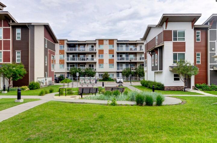 Property Photo: 370 Harvest Hills Common NE 307 AB T3K 2M8
