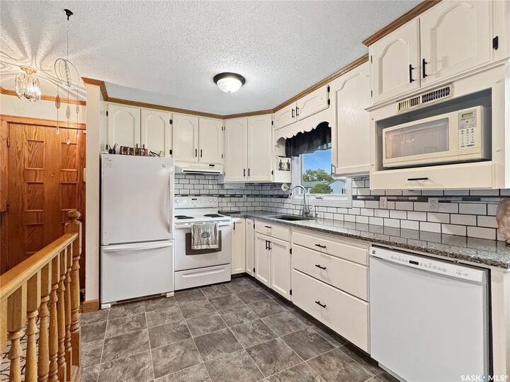 Property Photo: 11310 Asquith Avenue SK S9A 2N8