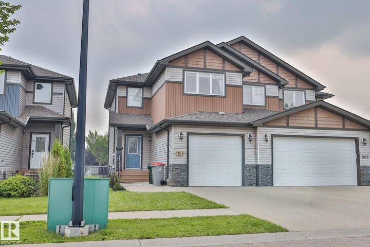 Property Photo: 304 Genesis Villa(S) AB T7Z 0J6