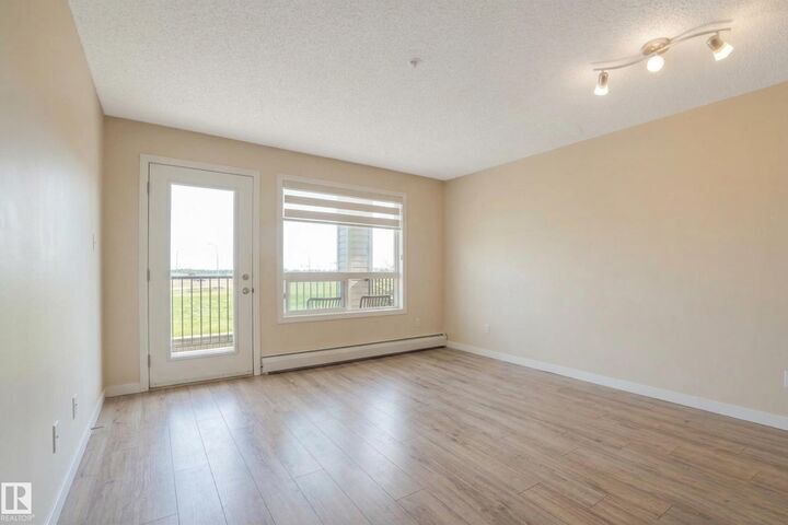 Property Photo: 7331 South Terwillegar Drive NW 6211 AB T6R 0L9
