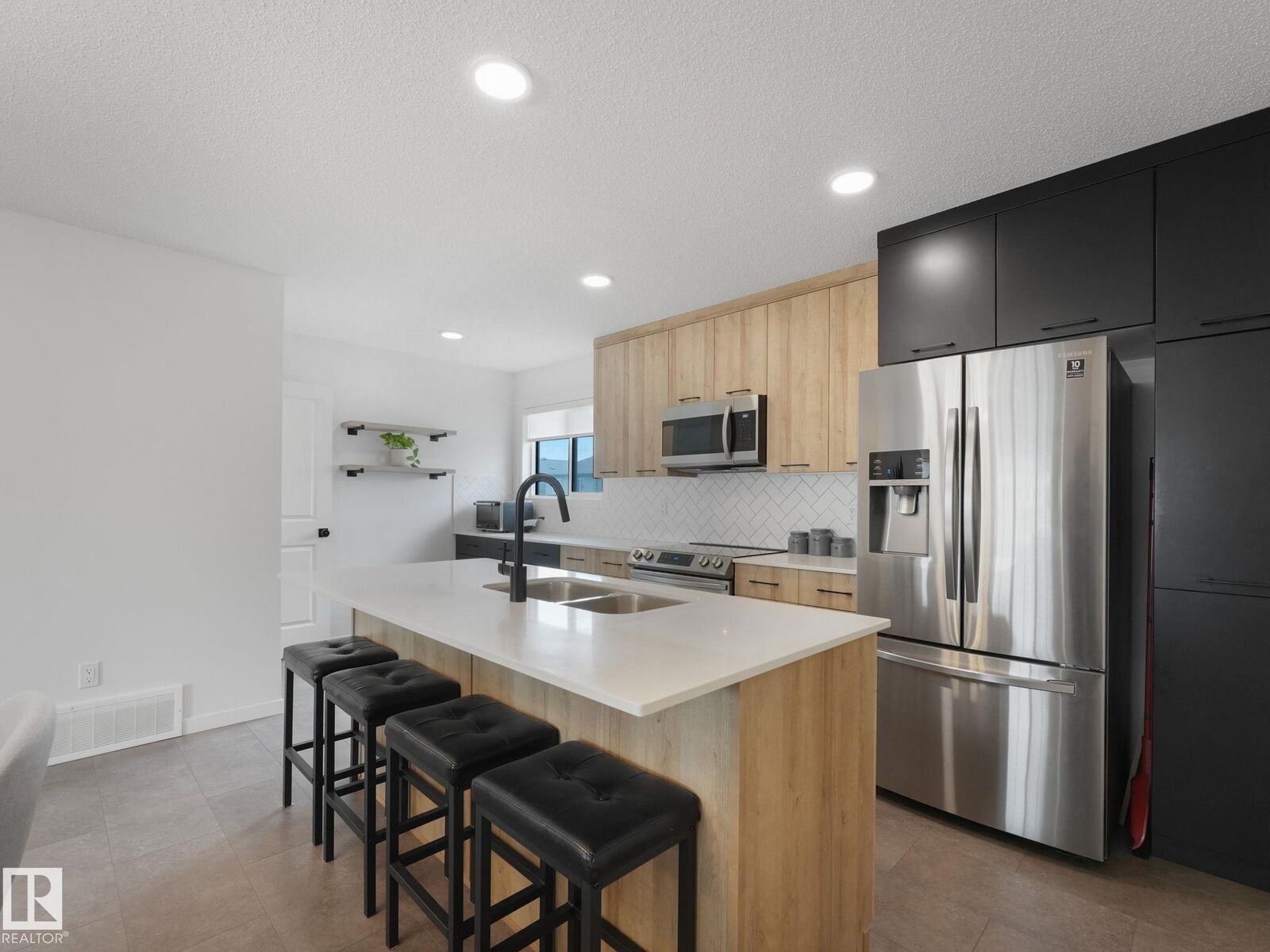 Property Photo:  1061 Cy Becker Road NW  AB T5Y 4B7 