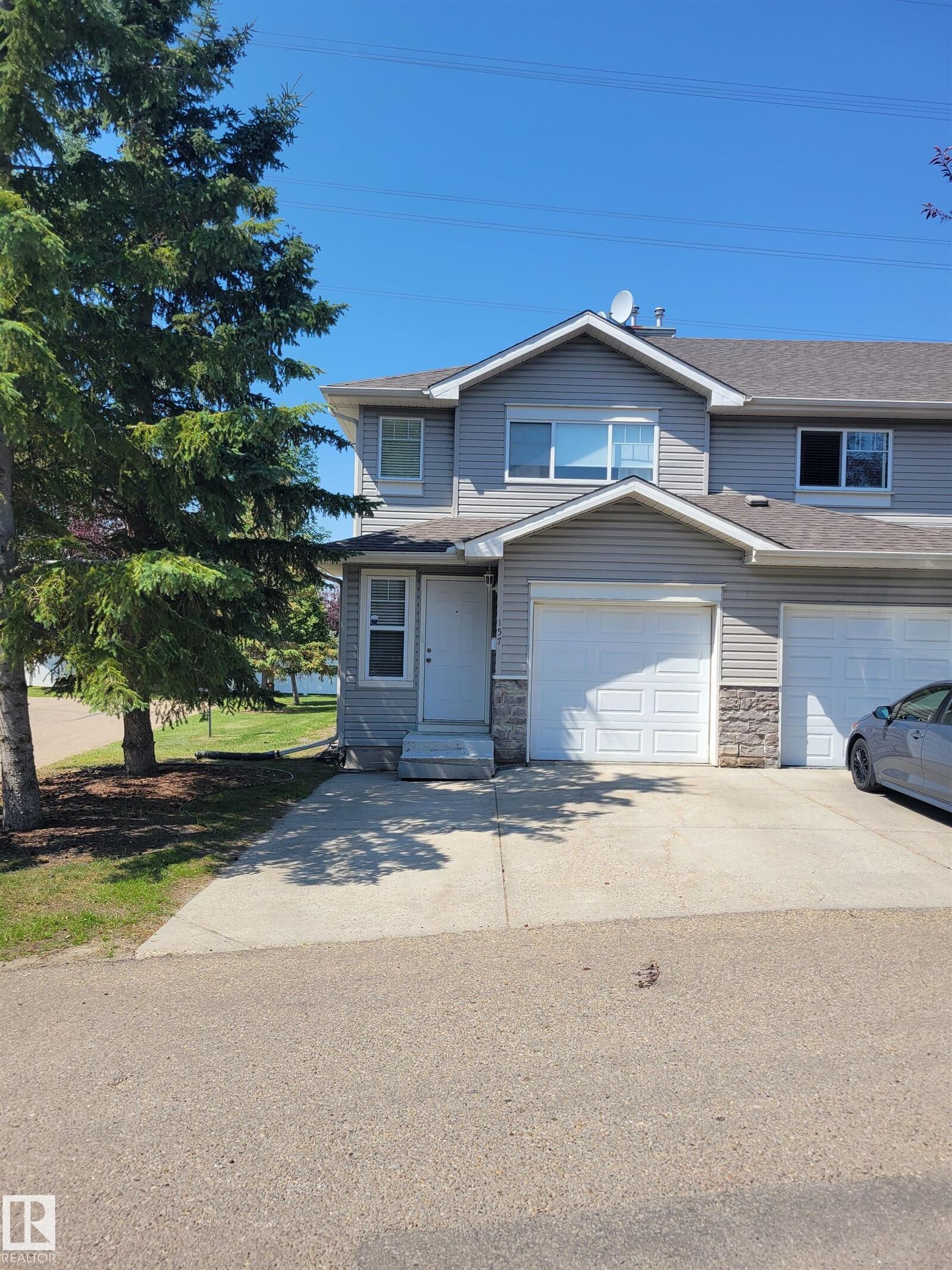 Property Photo: 230 Edwards Drive SW 157 AB T6X 1G7