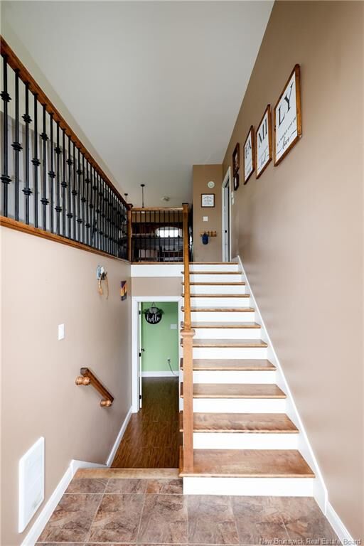 Property Photo:  75 Whisperwood Drive  NB E3C 0J8 