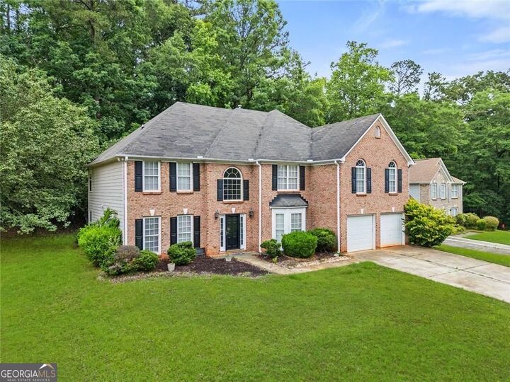 Property Photo:  6906 Wynmeadow Drive  GA 30087 