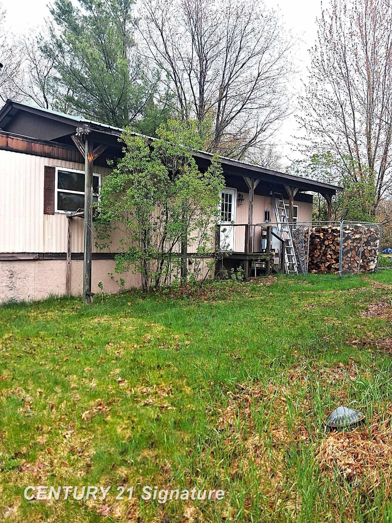 Property Photo: 5124 Highland Trail MI 48629