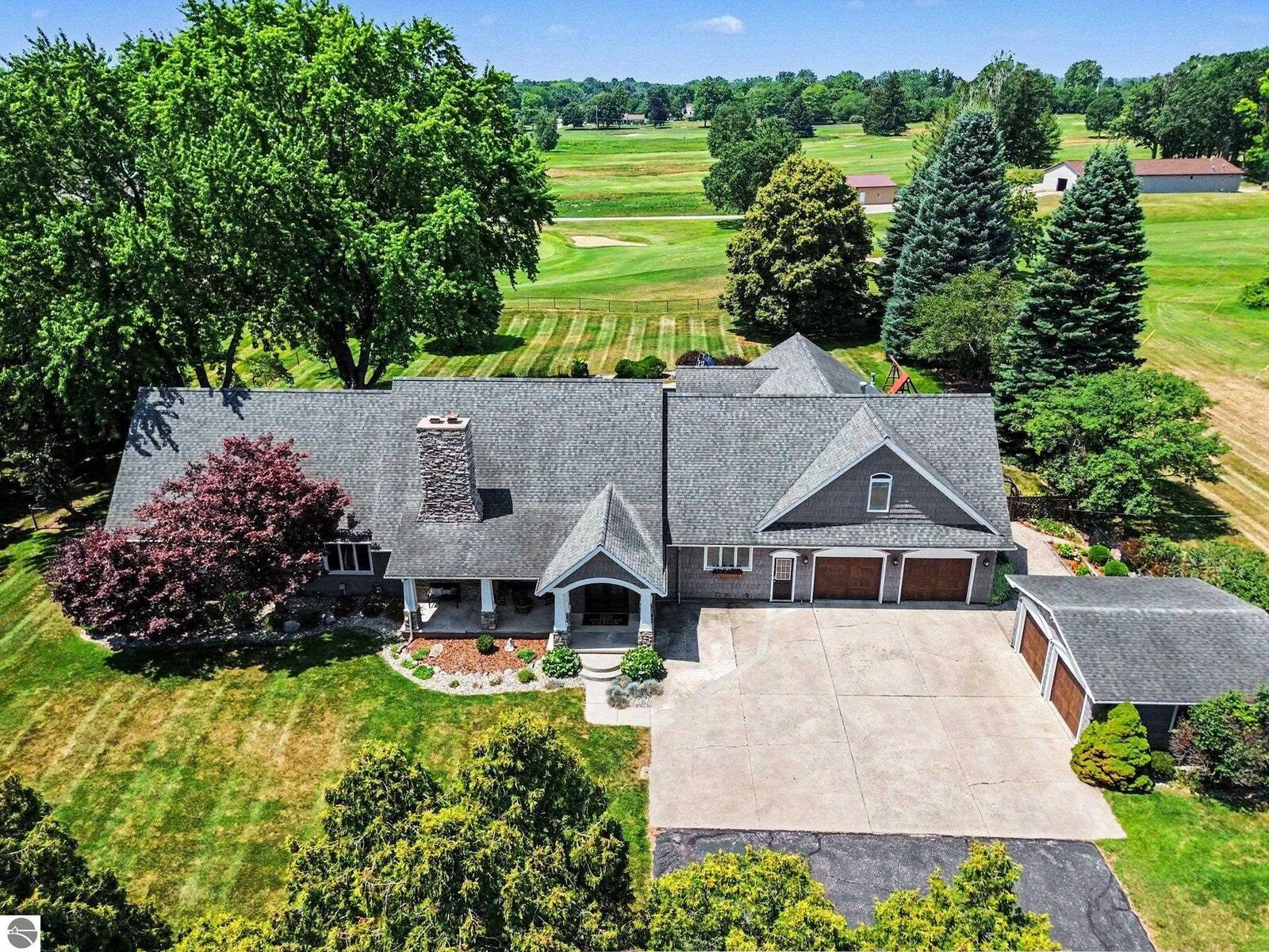 Property Photo:  115 Golfside Drive  MI 48801 
