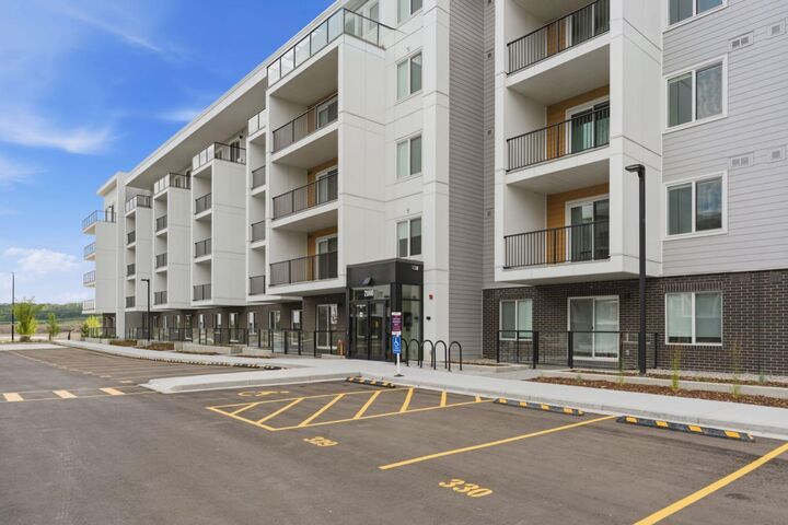 Property Photo: 265 Wolf Willow Boulevard SE 2110 AB T2X 6P9
