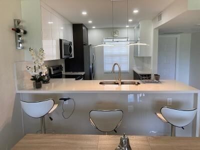 Property Photo:  565 Oaks Lane 305  FL 33069 