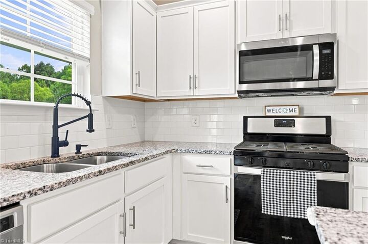 Property Photo: 6826 Bellawood Drive NC 27370