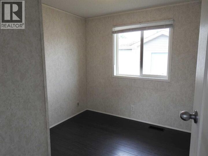 Property Photo:  218 Oak Wood Drive Northwest  AB T6P 0A4 
