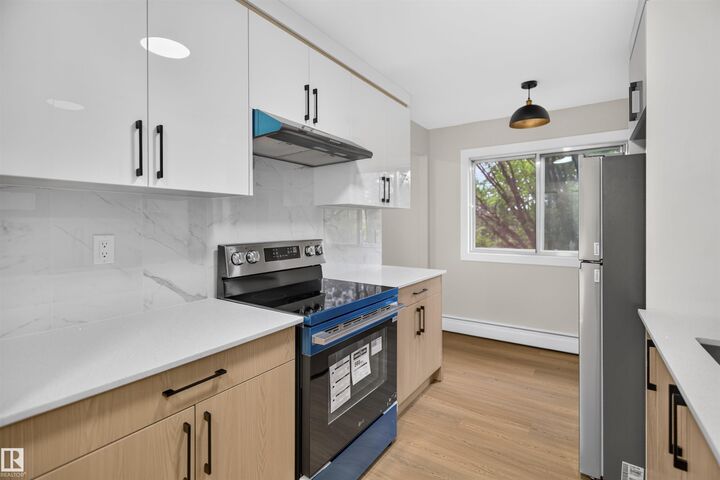 Property Photo:  11907 81 Street NW 305  AB T5B 2S7 