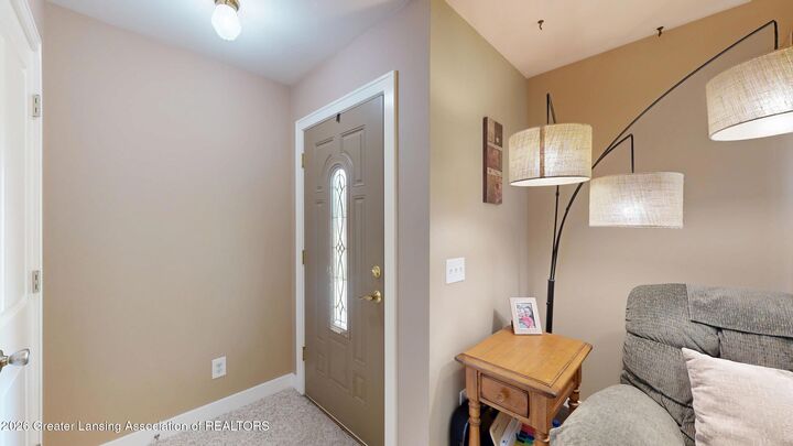 Property Photo:  2406 Lyman Drive  MI 48912 