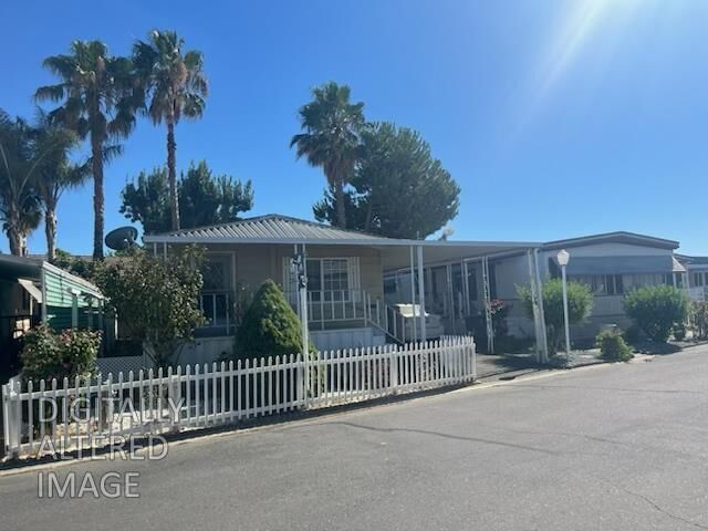 Property Photo:  1400 Meredith Ave 30  CA 95322 
