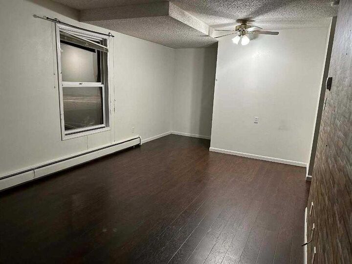 Property Photo: 7201 Poplar Drive 3114 AB T8V 6S5