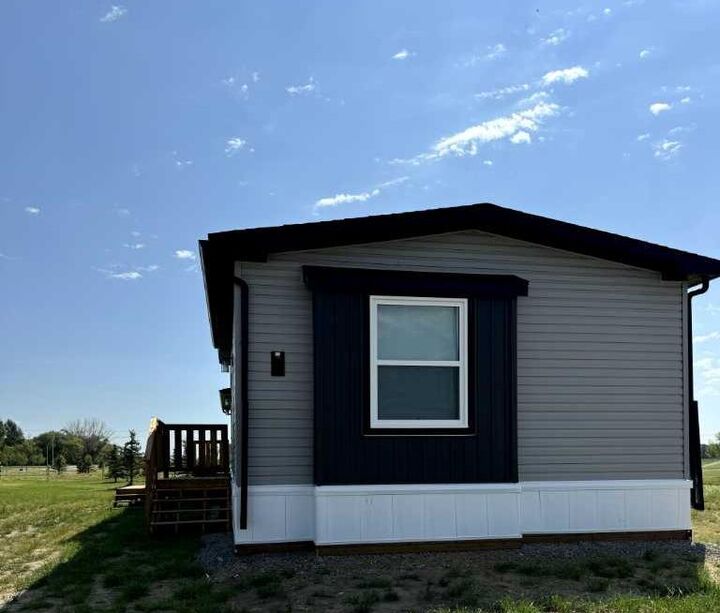 Property Photo: 6, 10, 14 Meadows Crescent AB T1G 0G7
