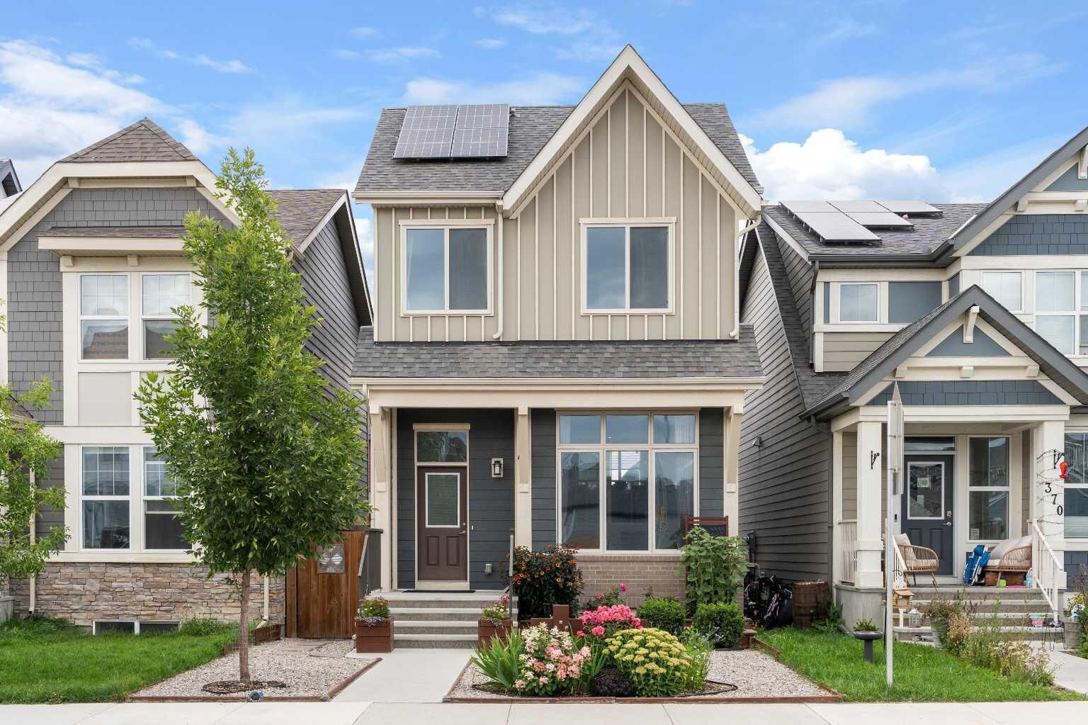 Property Photo:  374 Magnolia Square SE  AB T3M 2W4 