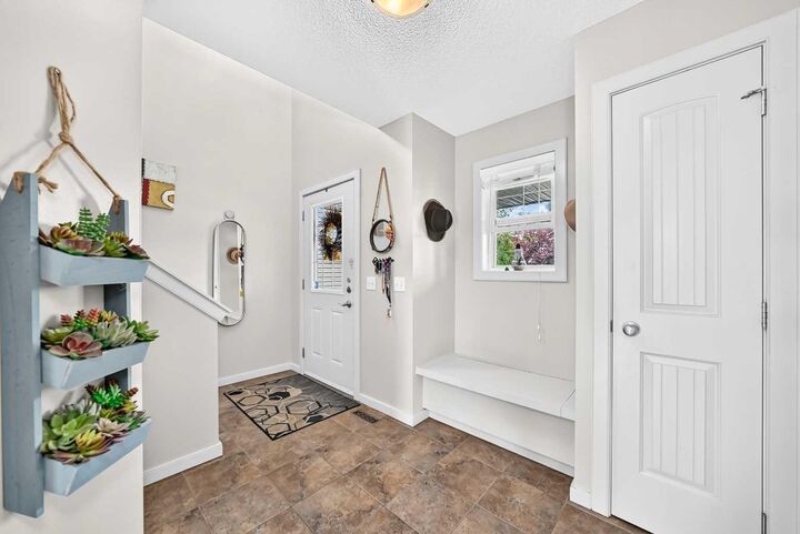 Property Photo: 7 Crystal Shores Heights AB T1S 2K9