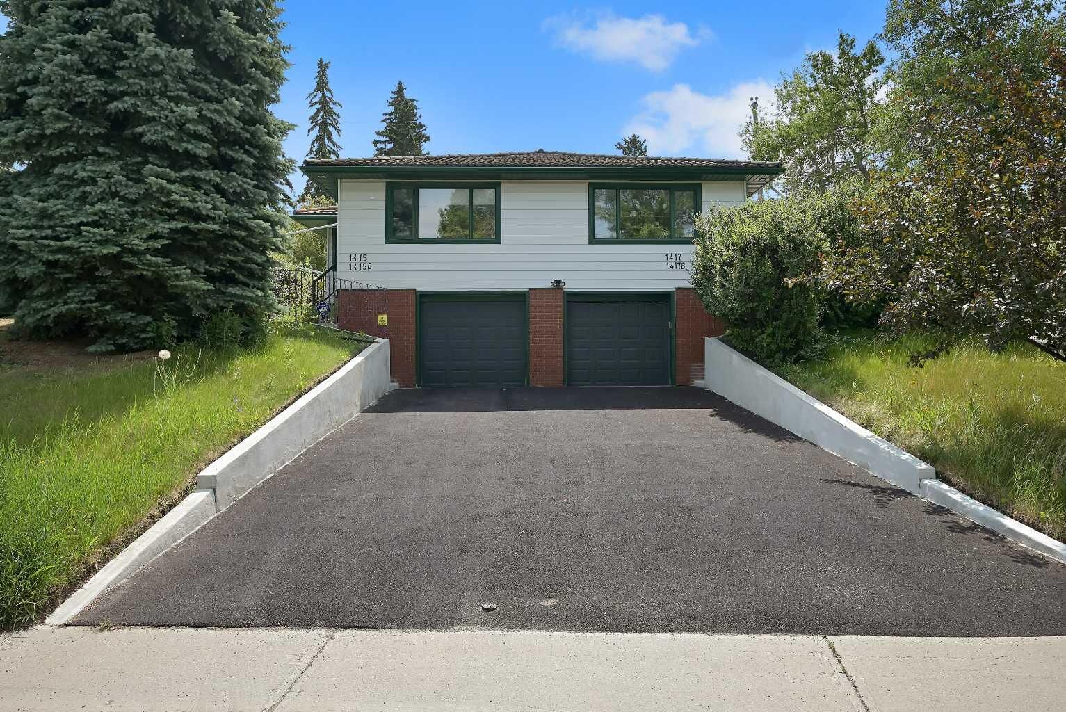 Property Photo: 1415 Rosehill Drive NW AB T2K 1M3