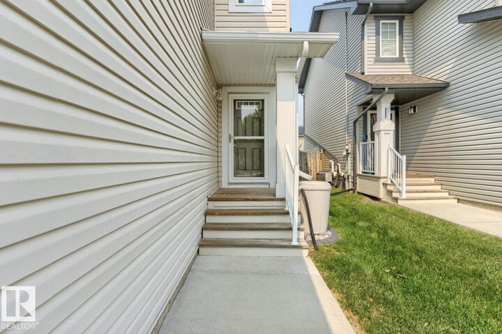Property Photo:  173 Sunterra Way  AB T8H 0T9 