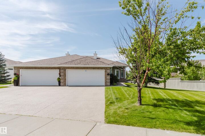 Property Photo: 6604 Sandin Cove NW AB T6R 0G2
