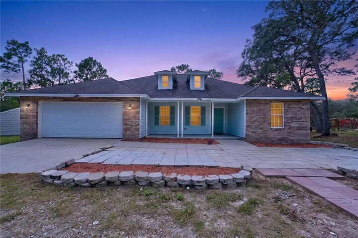 Property Photo: 230 SE 150th Avenue FL 32696