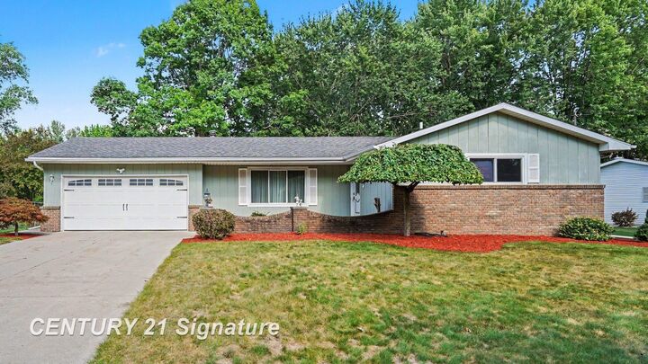 Property Photo: 1105 Saint Andrews Road MI 48638