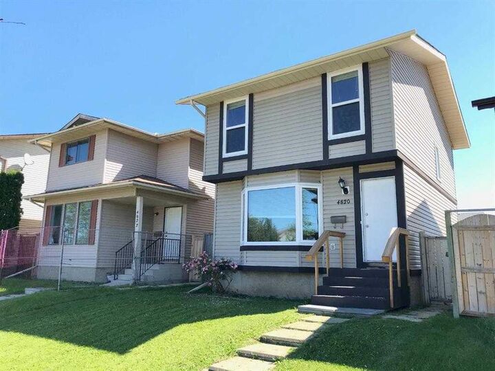 Property Photo: 4820 60 Street AB T1Y 5E9