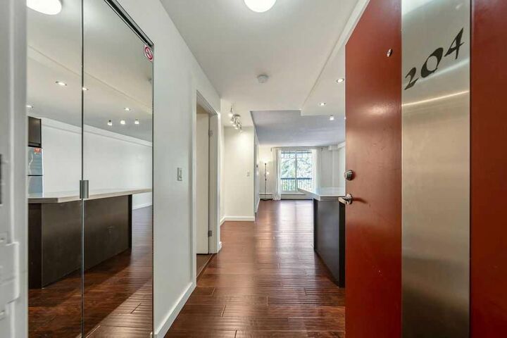 Property Photo:  1301 17 Avenue NW 204  AB T2M 0R2 