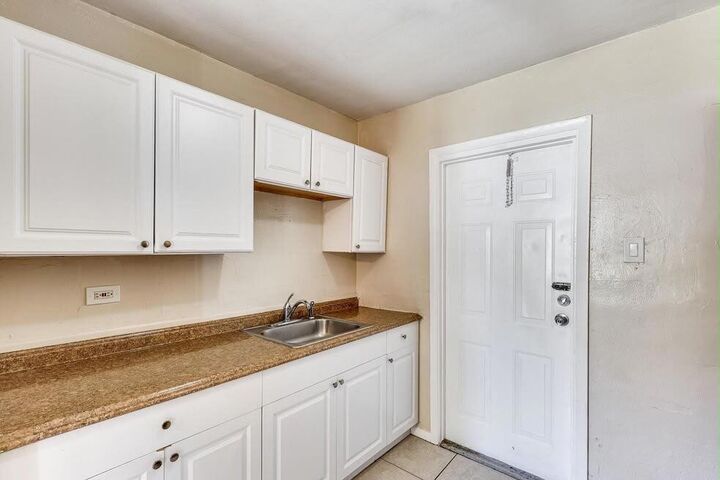 Property Photo:  1501 NW 24th Avenue  FL 33311 