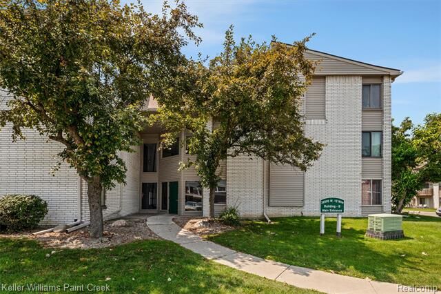 Property Photo: 32005 W 12 Mile Road 205 MI 48334