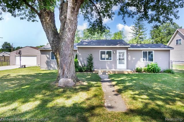 Property Photo:  9031 Garfield Drive  MI 48189 