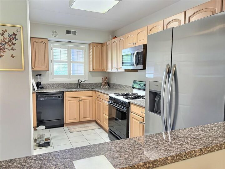 Property Photo: 650 East Greenwich Avenue 7109 RI 02893
