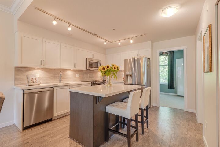 Property Photo: 6655 192 Street 208 BC V4N 0B9