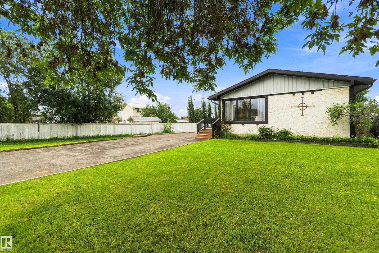 Property Photo: 5103 57 Avenue AB T9E 5S7