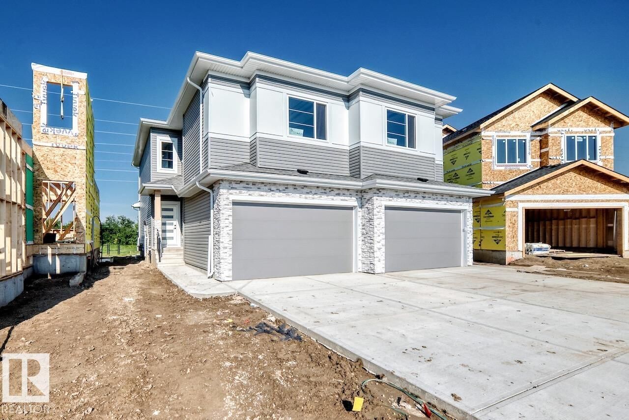 Property Photo: 106 Waverly Way AB T8L 0Z8
